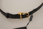 Dolce & Gabbana Elegant Black Leather Belt with Engraved Buckle